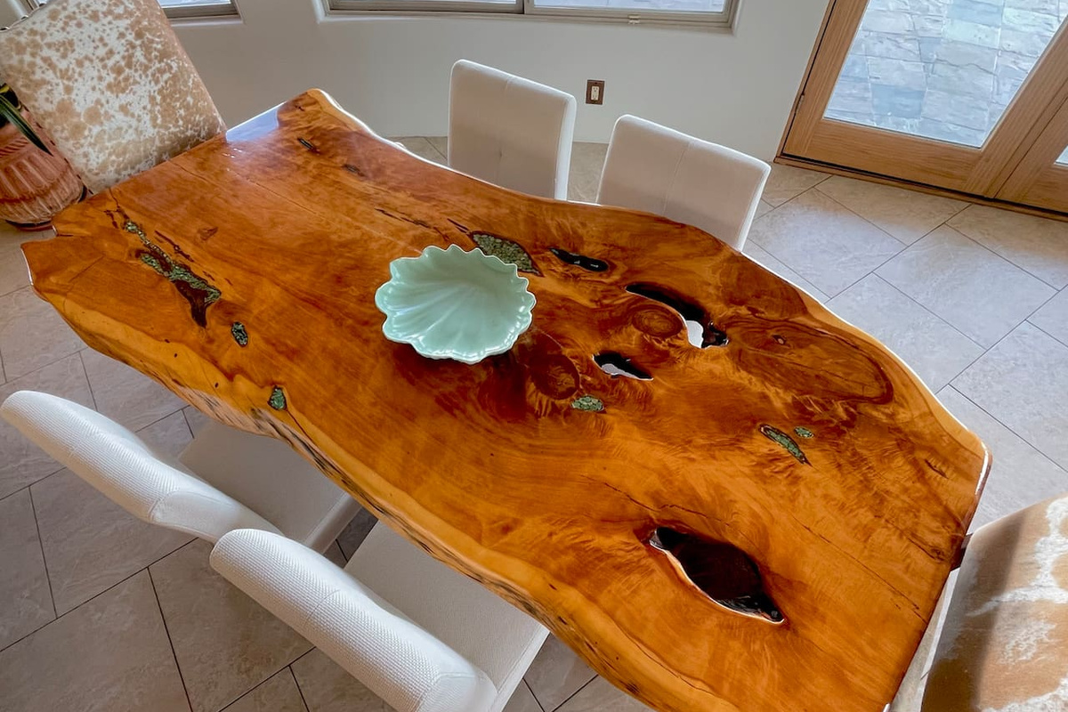 The natural wood dining table brings warmth and character to meals shared around the table.

