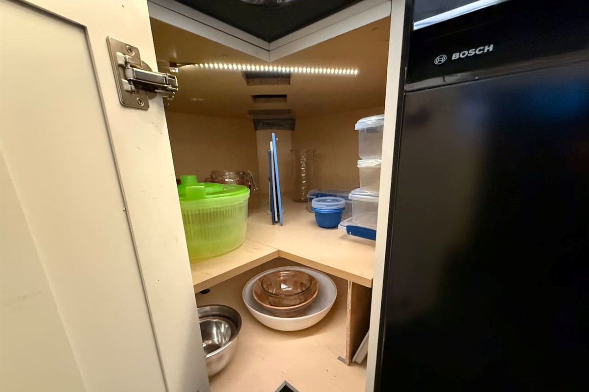 Cabinet Storage: Deep cabinet space is perfect for storing pots, pans, and plastic food containers, keeping the kitchen tidy and organized.