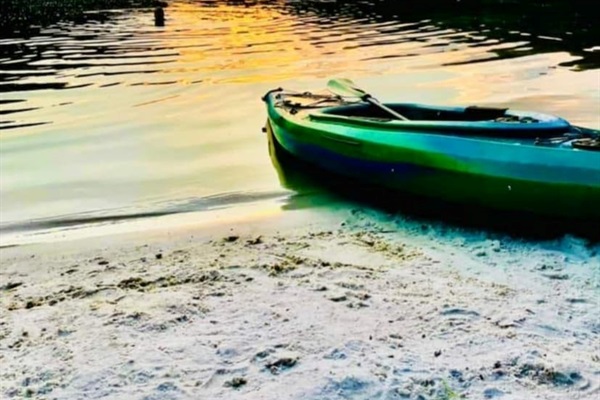 Our private beach- canoes and kayaks come with the cabin rental.