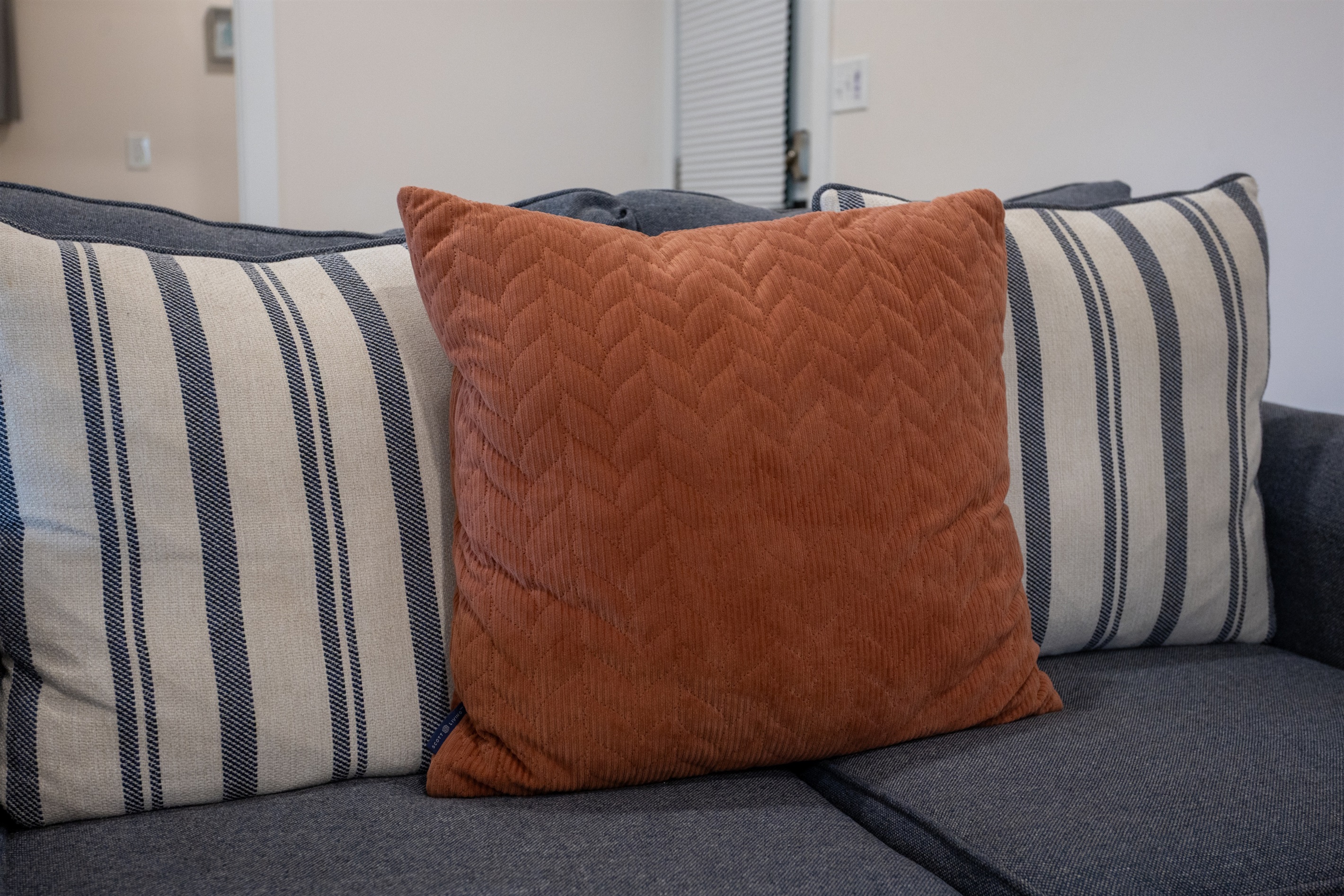 Sink into the plush sofa with soft pillows—perfect for morning coffee or evening wine.