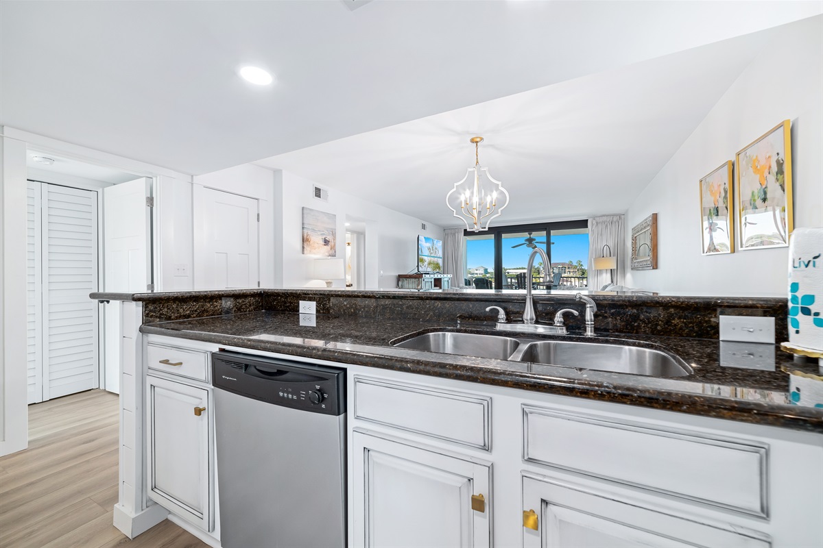 Bright and airy kitchen with ample counter space and modern amenities, creating an inviting space for cooking and gathering.