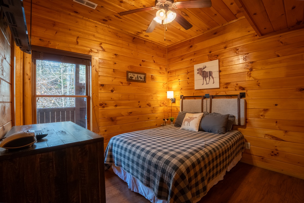 With a smart TV and ensuite bathroom, our comfy moose queen bedroom in the lower level is perfect!