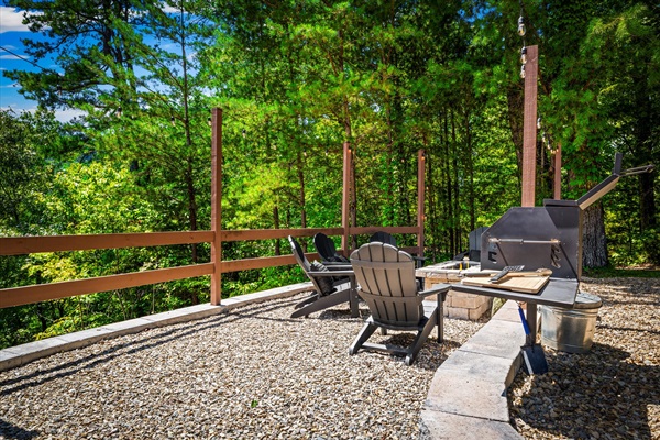 Gather around the propane fire pit under twinkling string lights for the perfect night in.