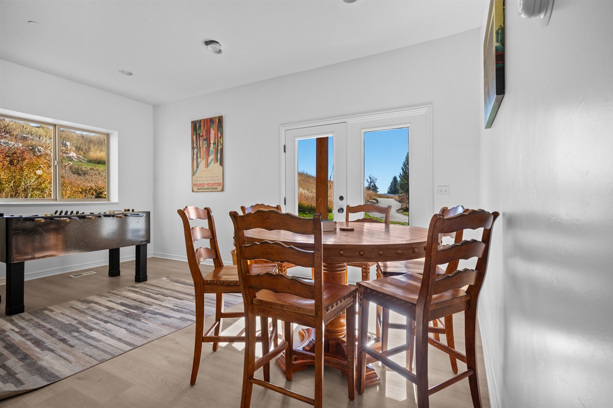 Enjoy dining or a card game in the Game room, located on the lower level. If it's chilly, you may want to enjoy a fire while you're there.  Or check out the patio, just through the French doors.