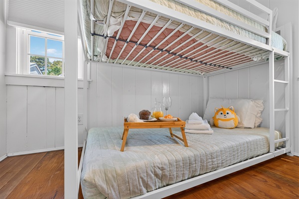 Second bedroom featuring a twin-size bunk bed.