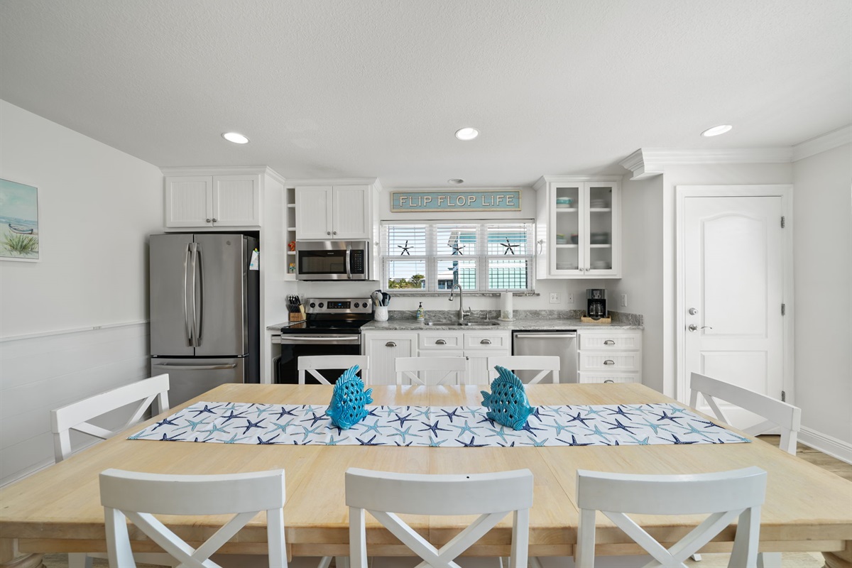 Large dining room table and chairs. Easily seating 8.