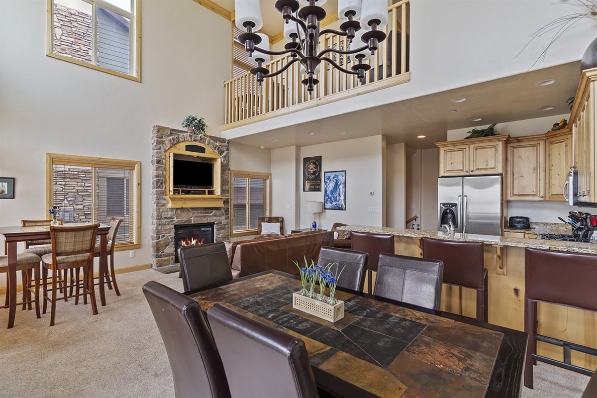 Open dining area overlooking the great room, ideal for shared meals and lively conversation.