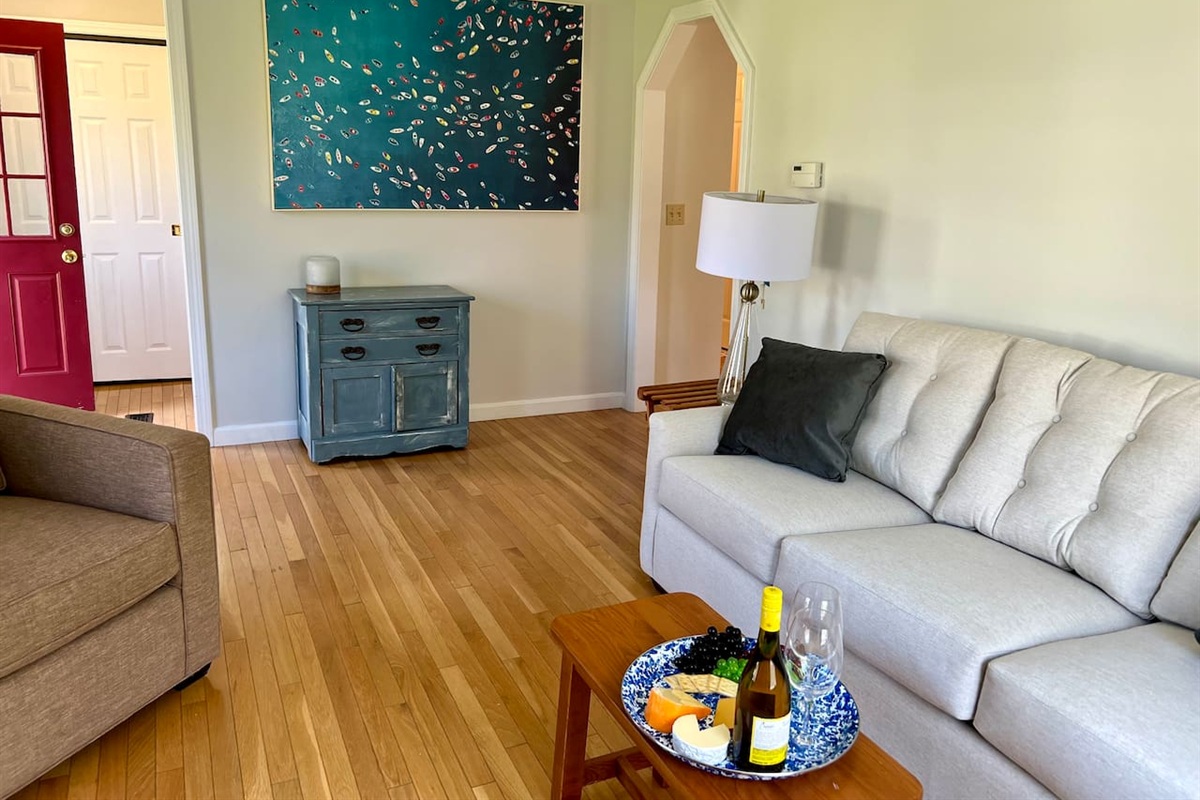 Enter Cape House to a cozy living room setup!