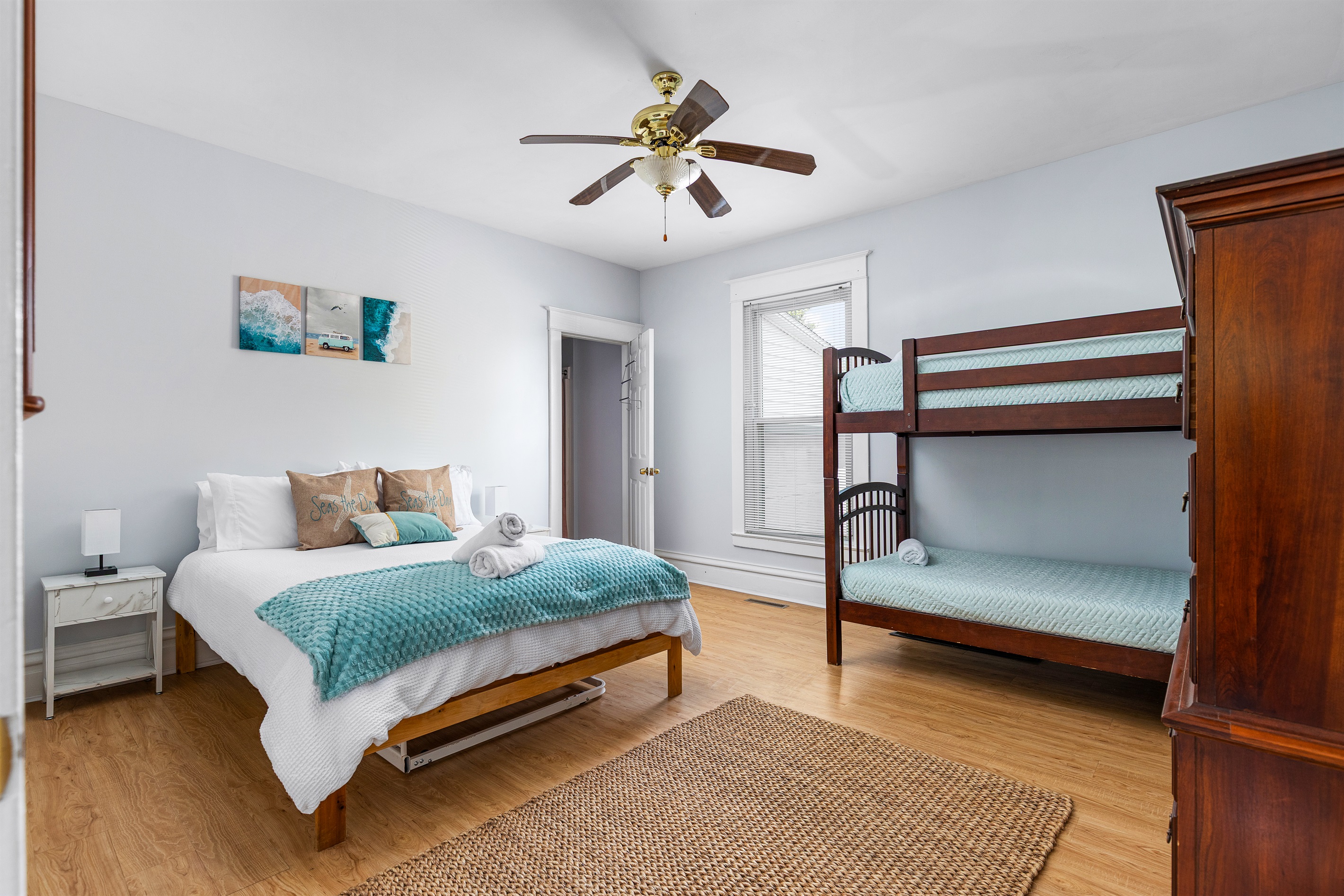 Unwind in this serene main floor bedroom that offers calm, comfort, and easy accessibility for every generation.