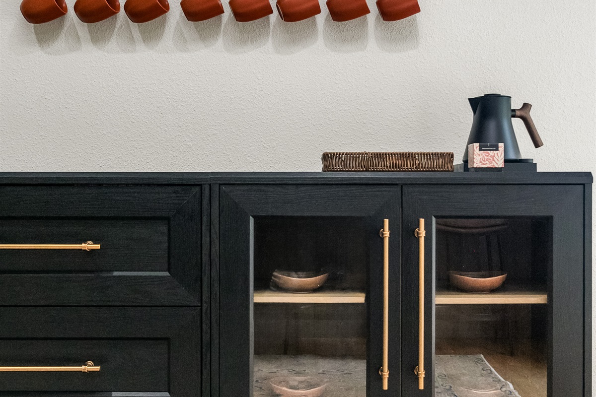 A coffee and tea bar features high-end Fellow kettle, brewer, and grinder with local gourmet coffee and Smith's tea provided