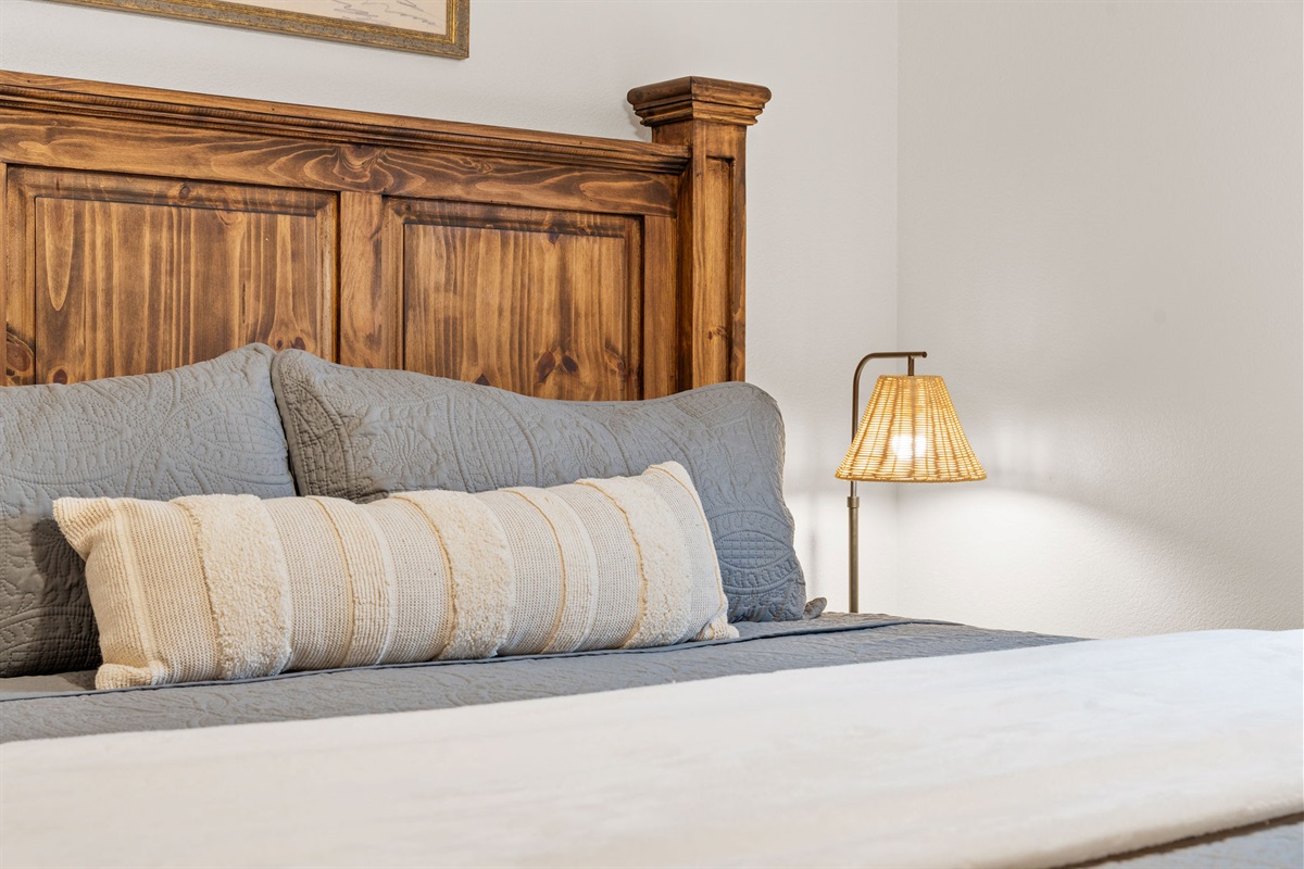 Bedroom detail with accent pillows