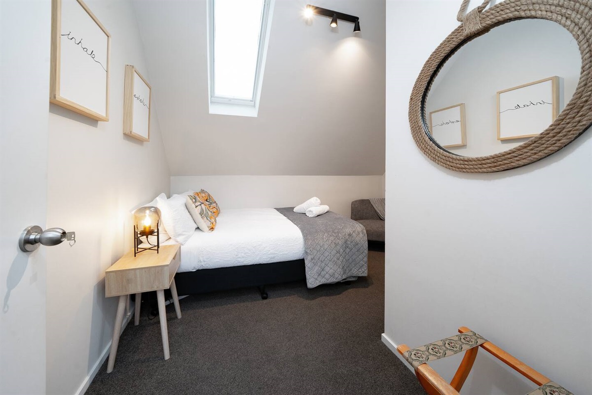Bedroom 2 adds another comfortable sleeping space within Fernhill Mountain Escape, supporting the apartment’s four-bedroom layout.