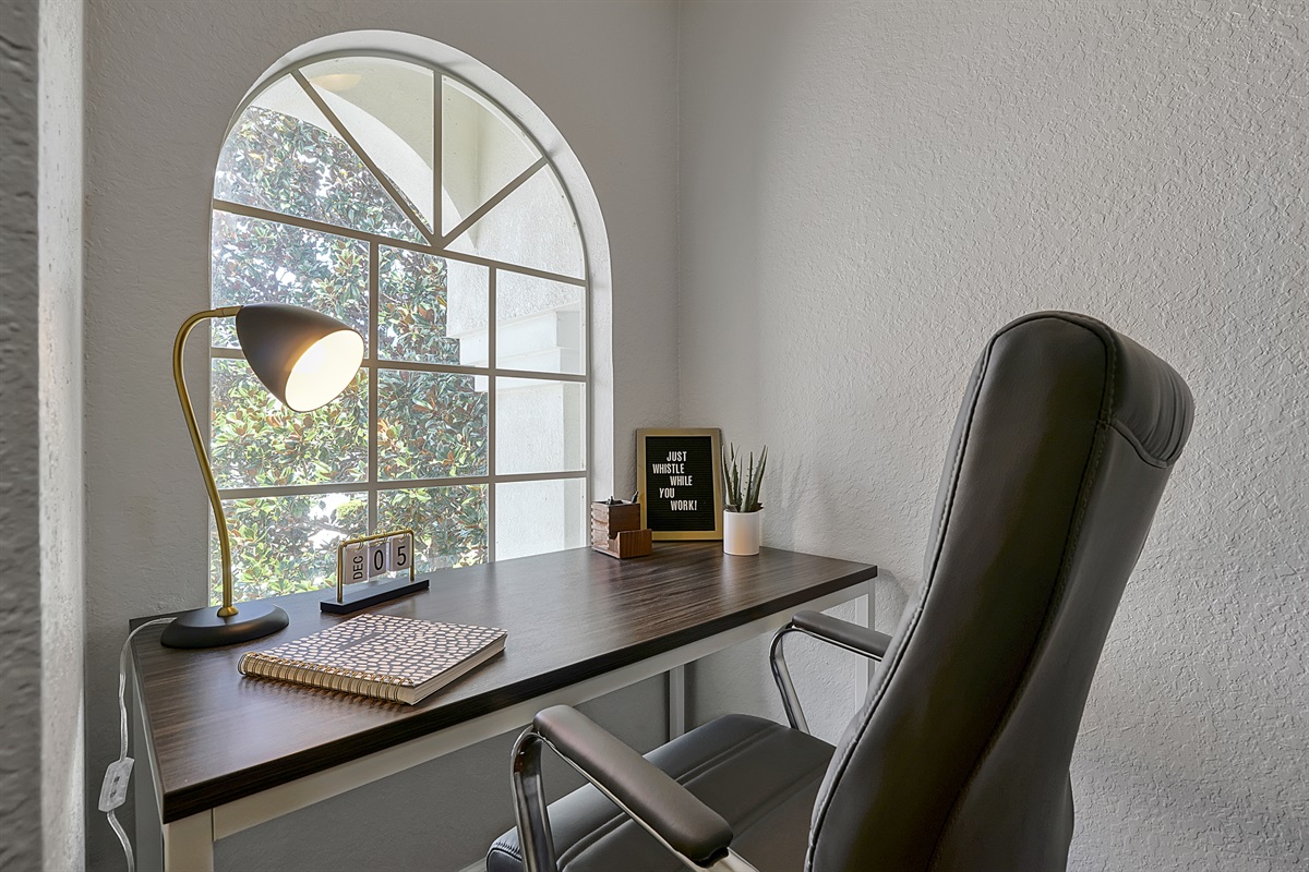 Working remotely? Do it in style with a palm tree view from the comfortable and convenient work station desk.
