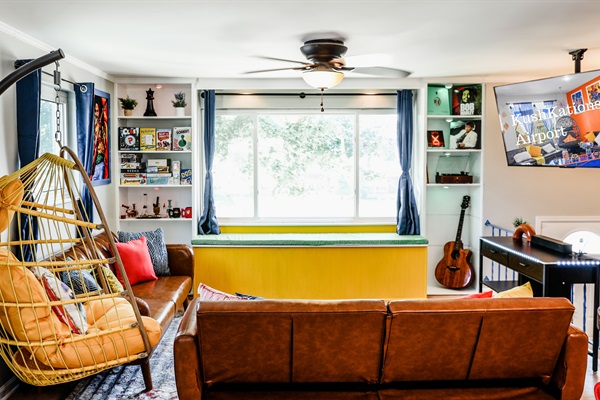 Craft unforgettable memories in our living room, featuring cozy couches and a TV perfect for movie nights.