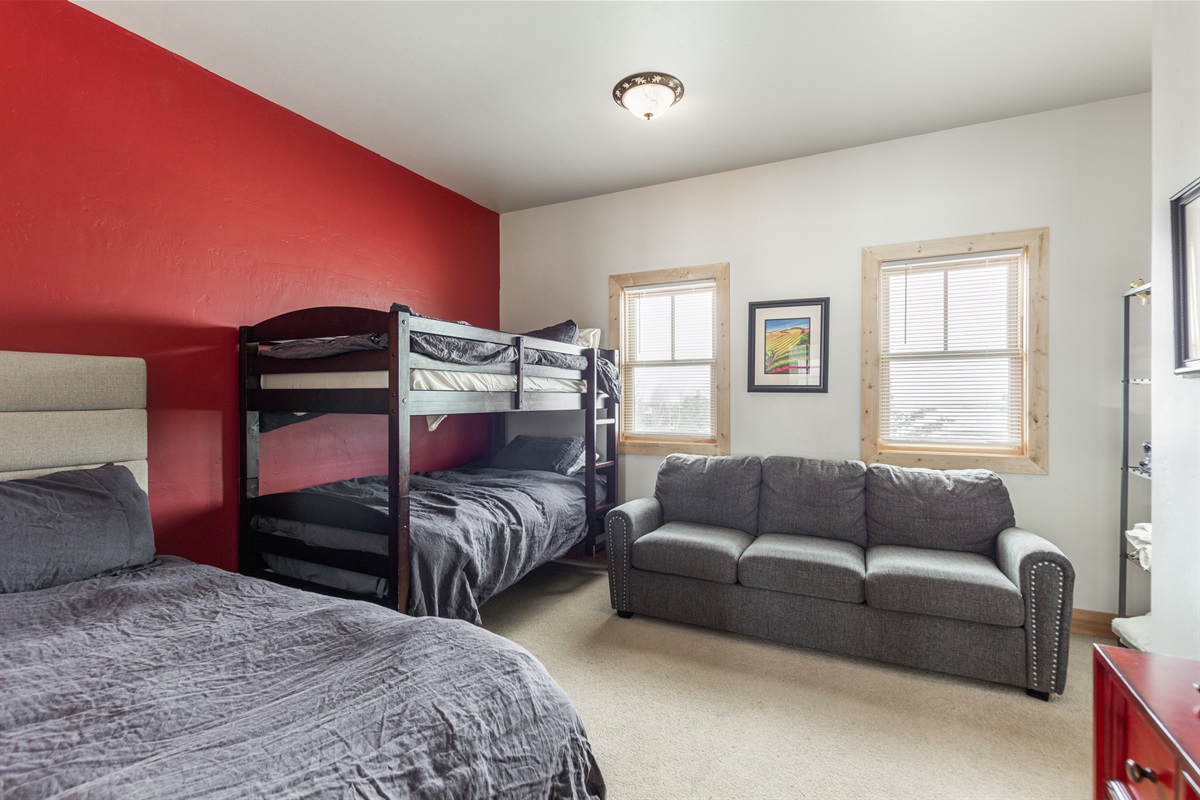 Bedroom 3 with queen size bed, twin bunk beds and a queen size pull out.