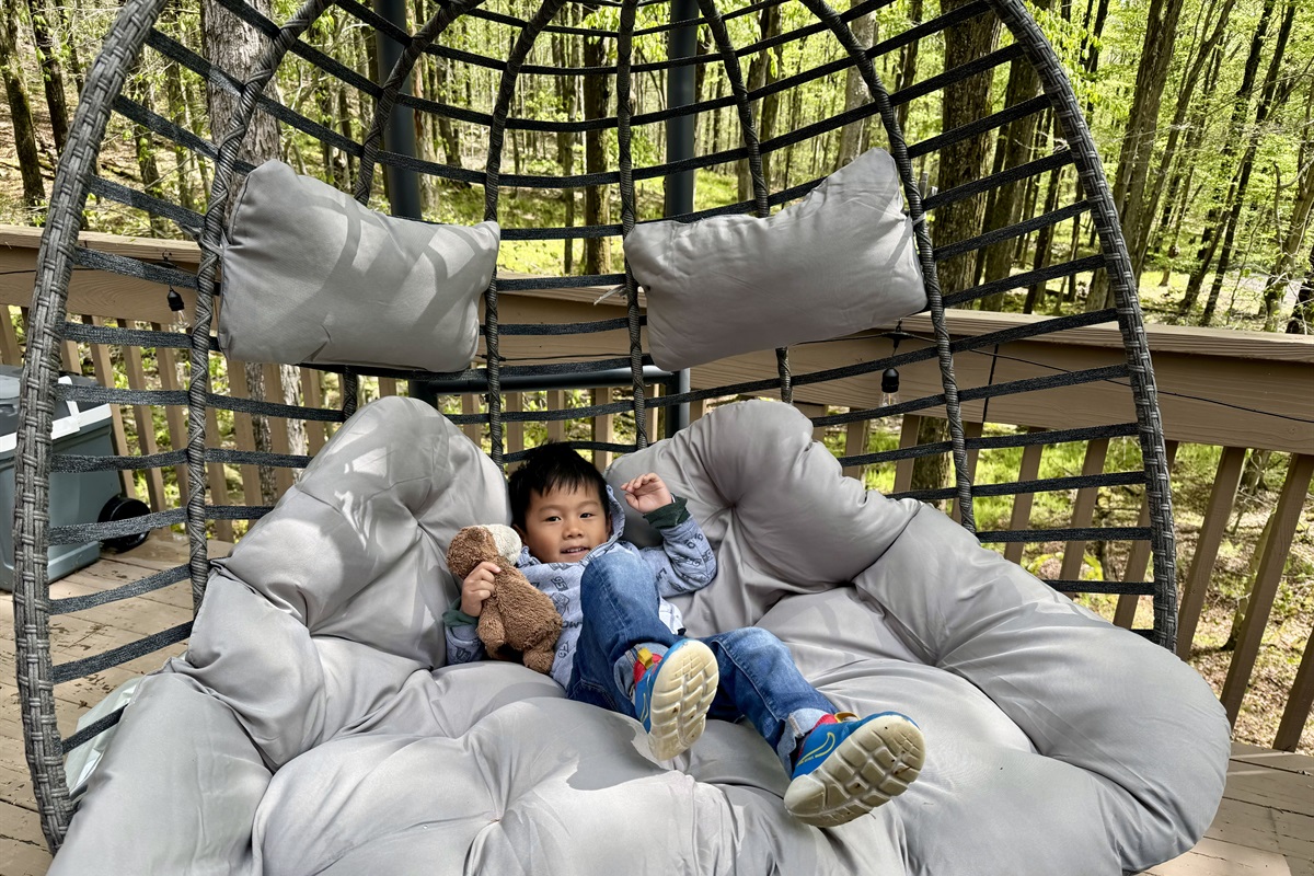 “Happy camper vibes — outdoor seating for sunny day lounging.”