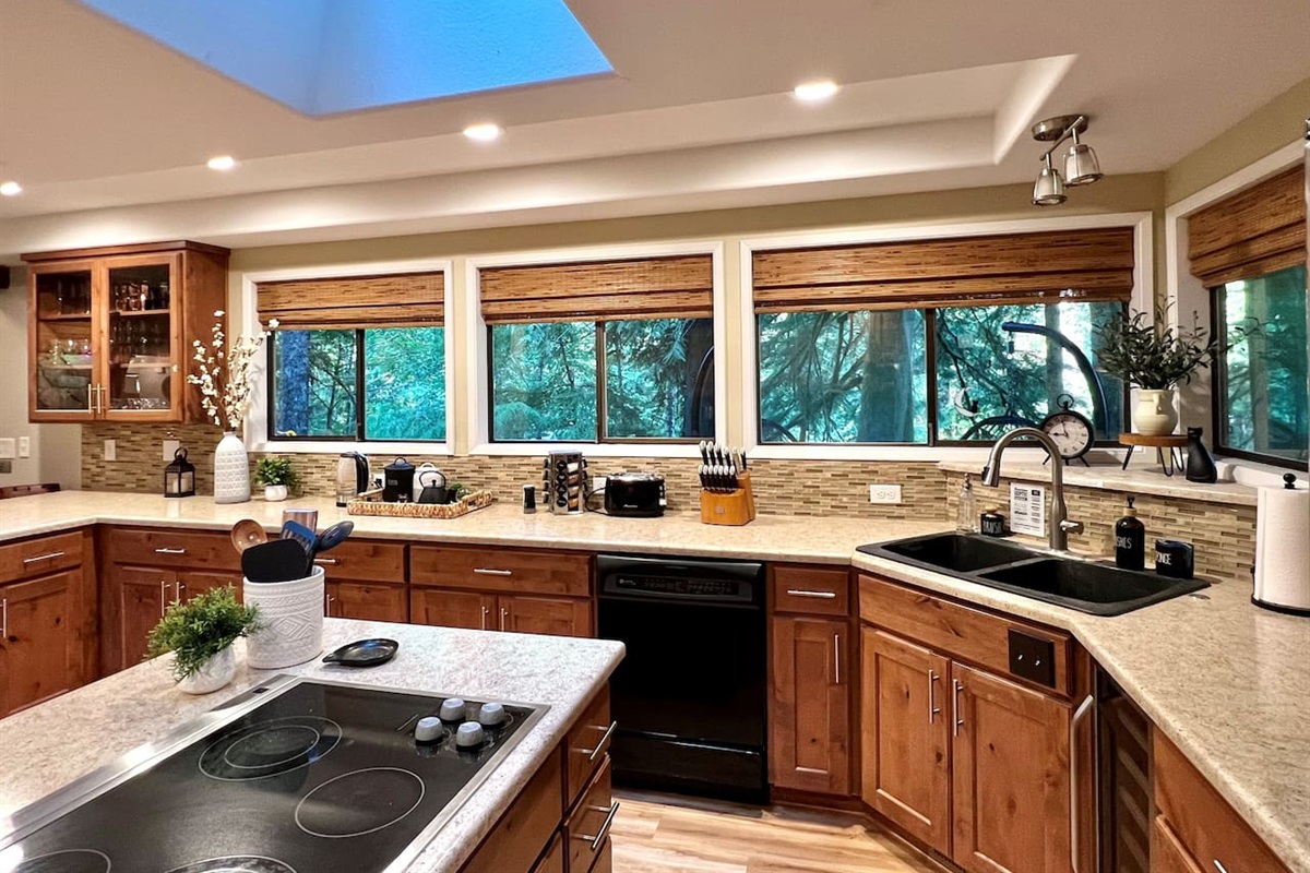 Expansive Kitchen with a view of Back Deck and Sandy River