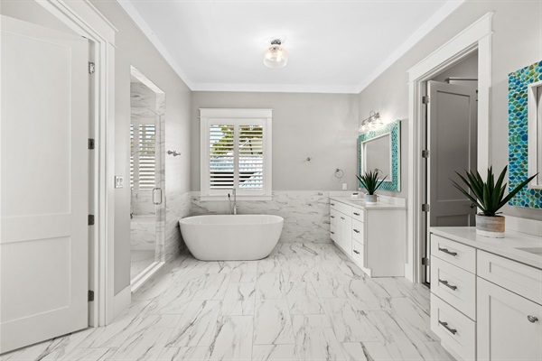 Unwind in the spacious primary bathroom, separate tub and walk in shower, 2 vanities