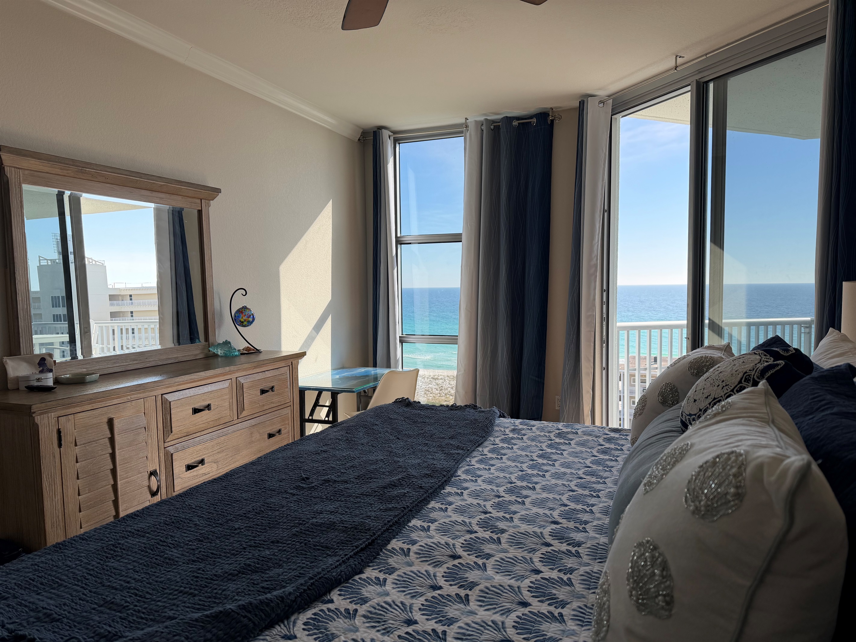 Master bedroom, King bed and wall mounted TV. Beautiful table can be used as desk or makeup table.