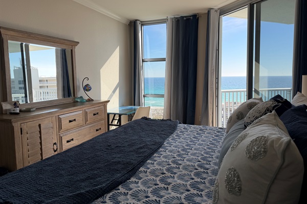 Master bedroom, King bed and wall mounted TV. Beautiful table can be used as desk or makeup table.