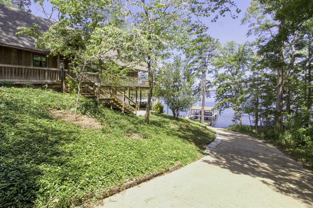 Private boat ramp on site.   Concrete, hillside, with slight curves.   