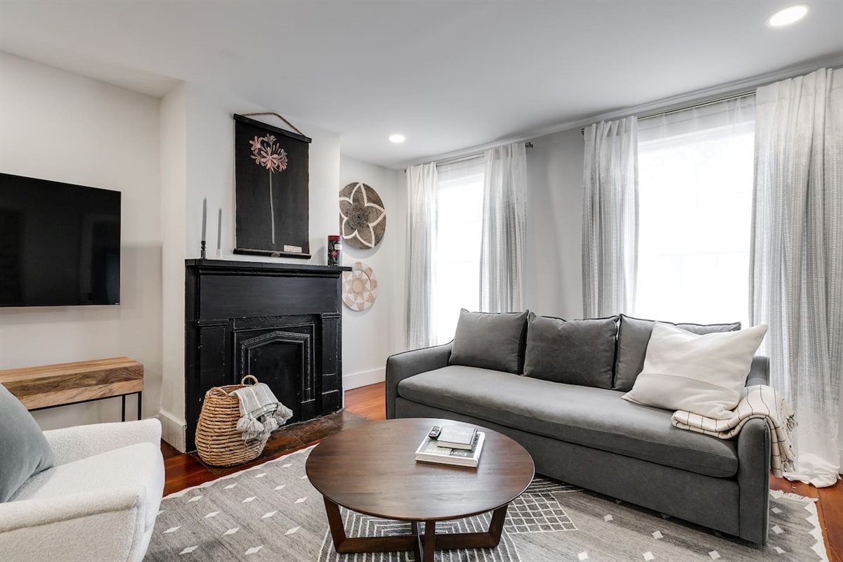 Living Room: Stylish decor meets comfort, perfect for relaxation and movie nights!
