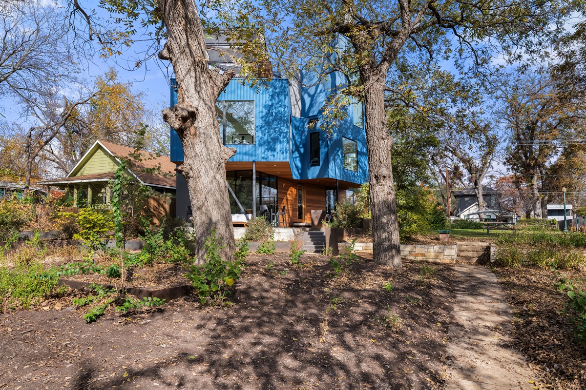 Spacious yard with natural landscaping, offering plenty of room to unwind, explore, or enjoy time outdoors.