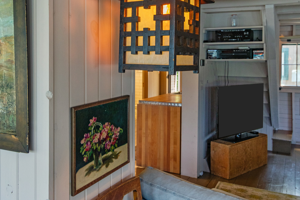 Warm lighting and unique cottage details throughout the home create a cozy atmosphere that makes it easy to settle in and relax.