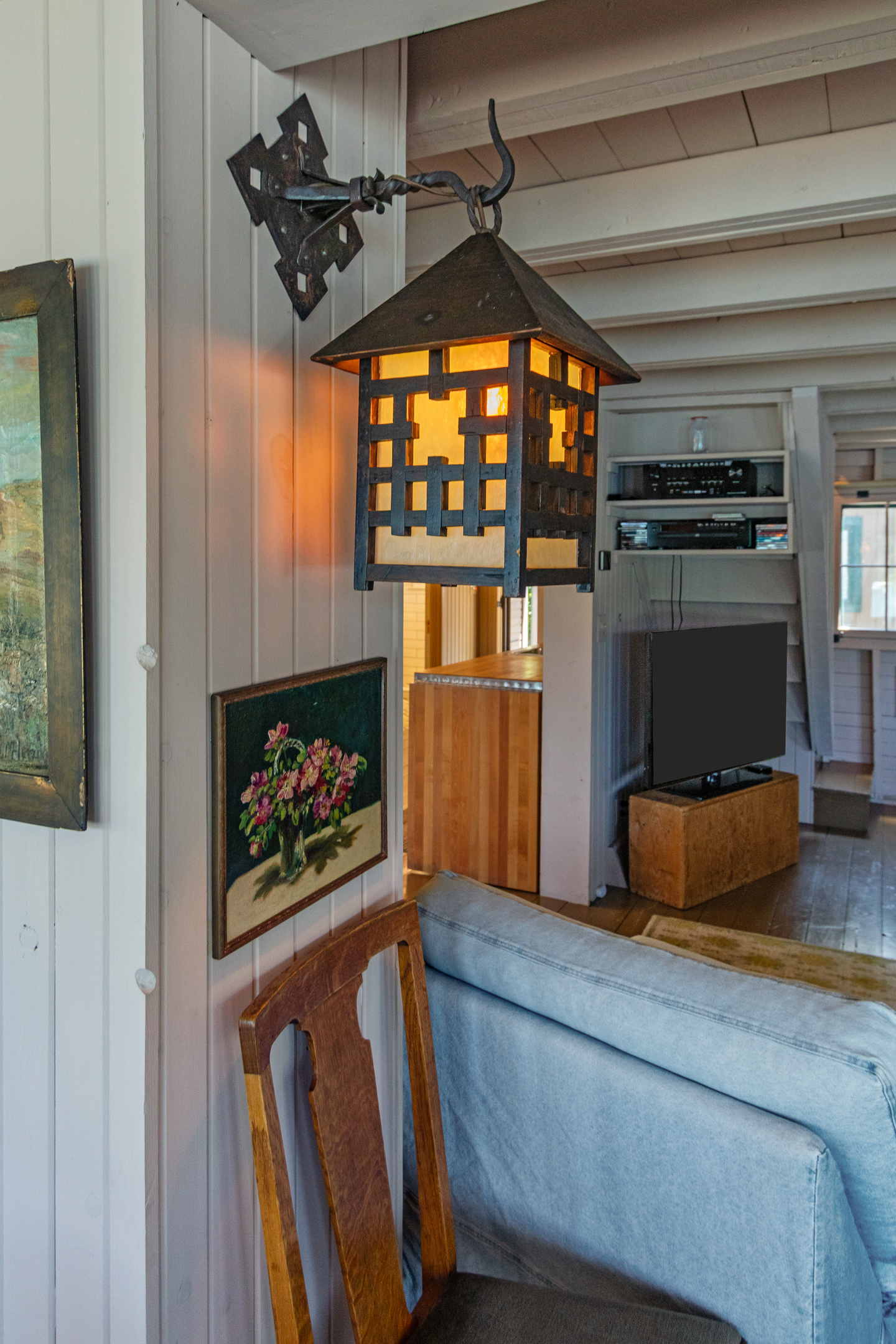 Warm lighting and unique cottage details throughout the home create a cozy atmosphere that makes it easy to settle in and relax.