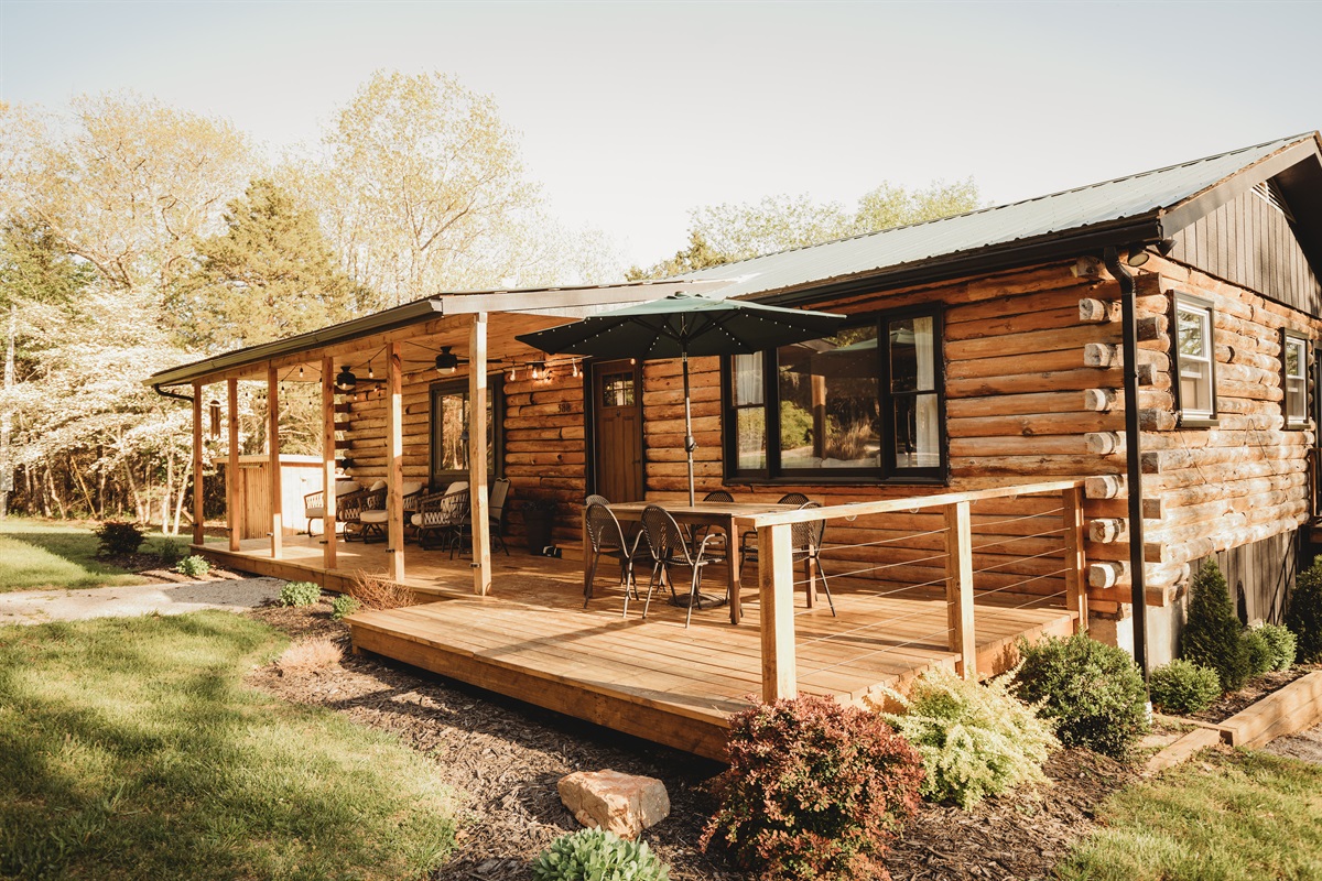 Enjoy an authentic log cabin nestled on 10 secluded acres with plenty of space to relax and enjoy nature.