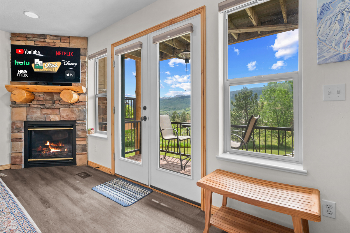 With stunning views, a glowing fireplace, and inviting decor, this is the perfect spot to relax and recharge.