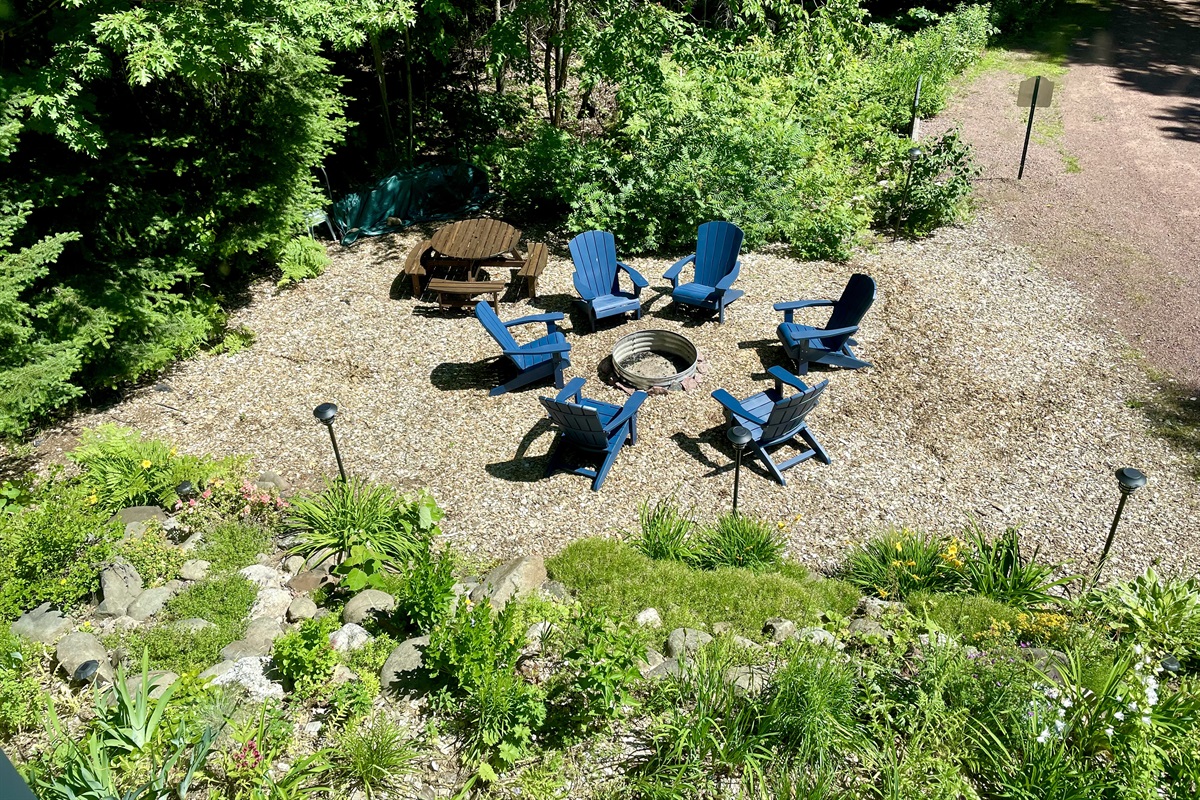 View or rock garden from upstairs bathroom two large windows to take in the perennial garden and wooded views, blinds for privacy. 