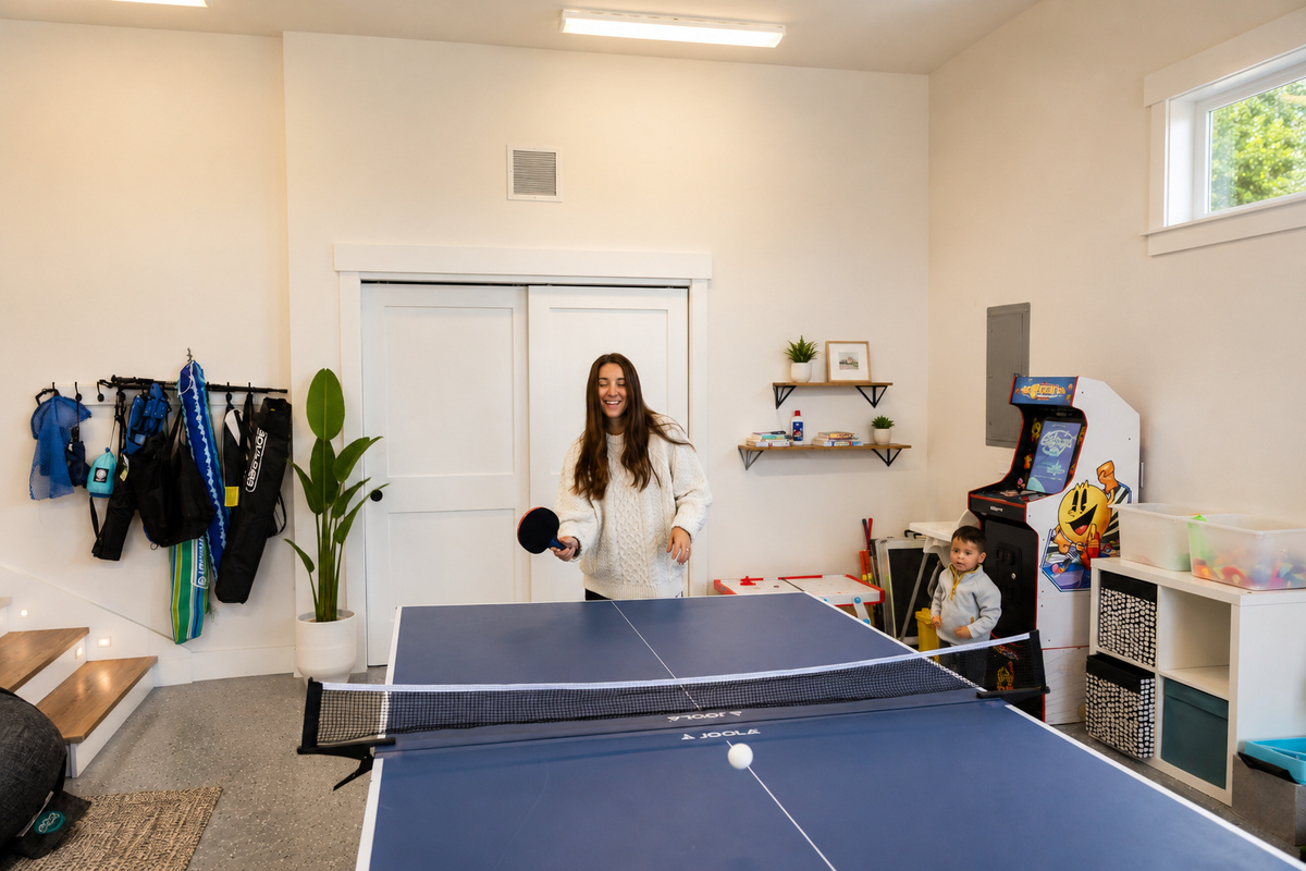 {Game Room} Family fun starts here: ping pong showdowns, Pac-Man high scores, and endless laughs.
