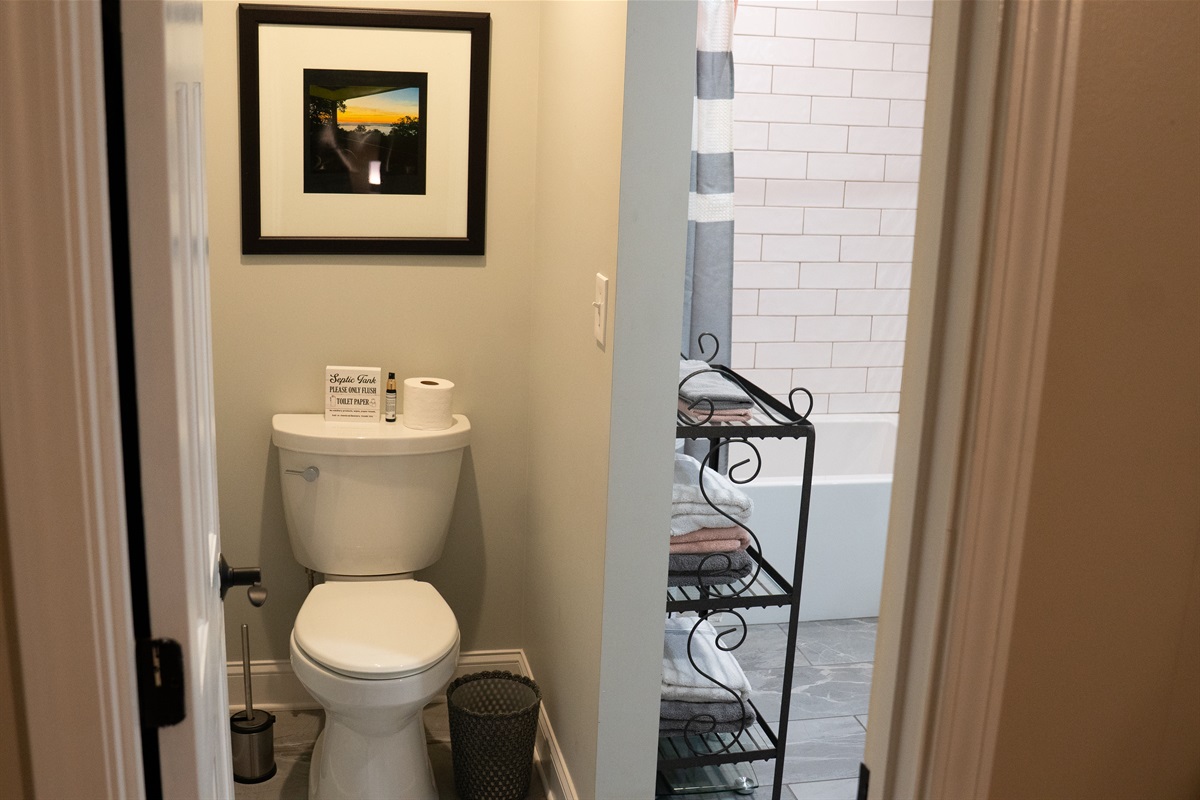 The spacious bathroom connects directly to the master suite.