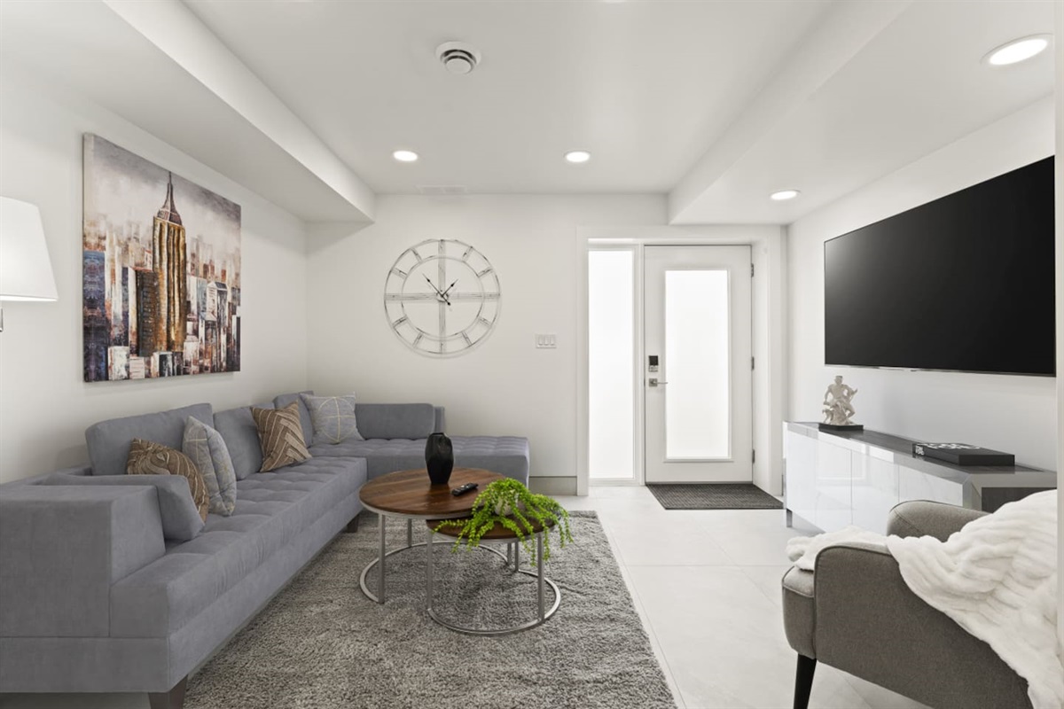 A comfortable living room design for entertainment and relaxation.