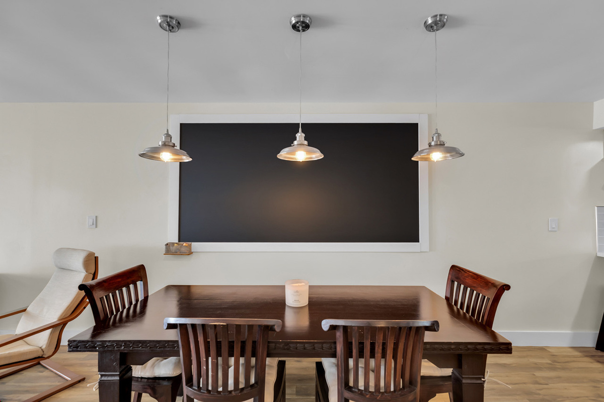 Dining table with bench seating on opposite side
