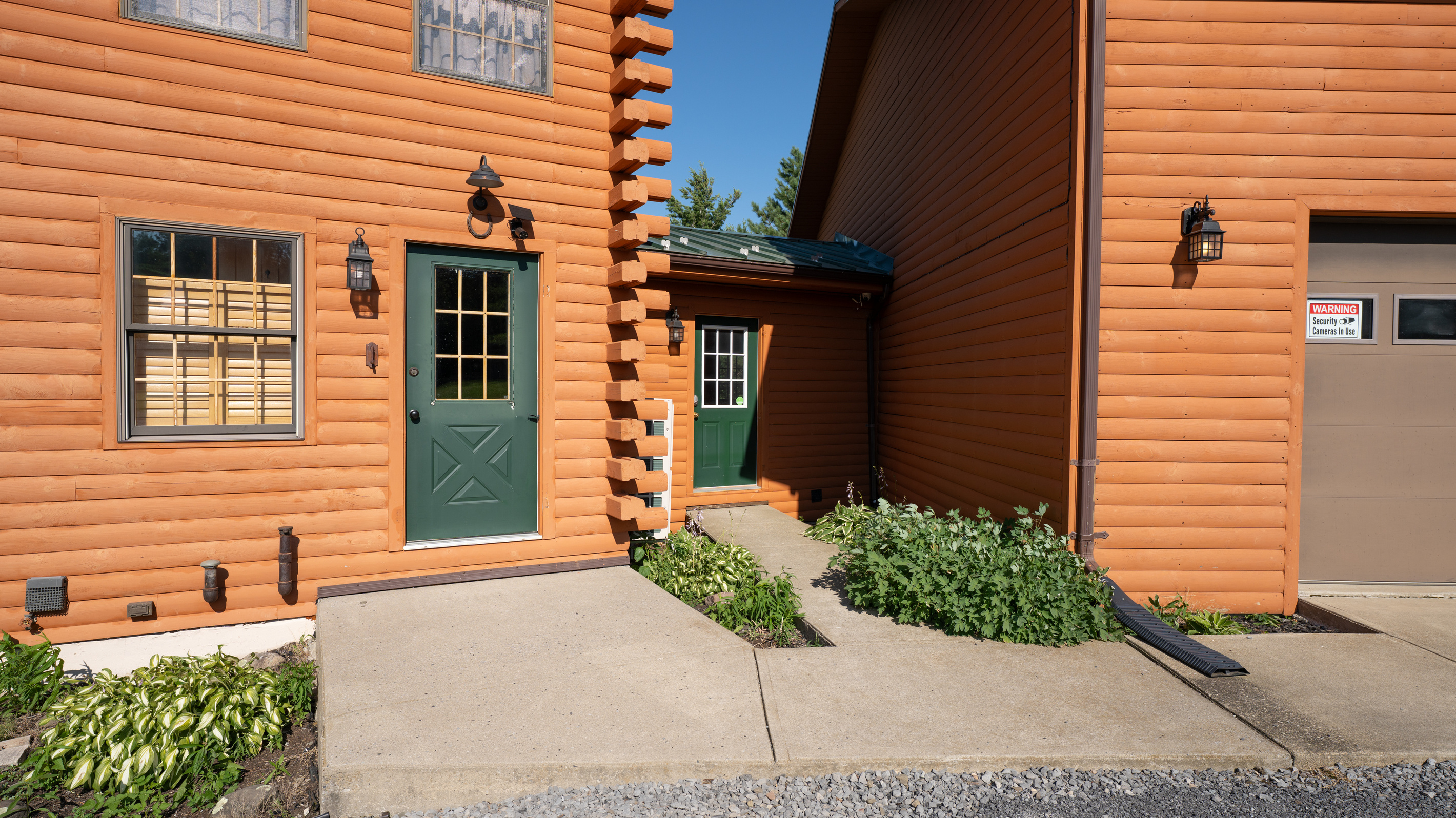 Walkway leading to the green door
