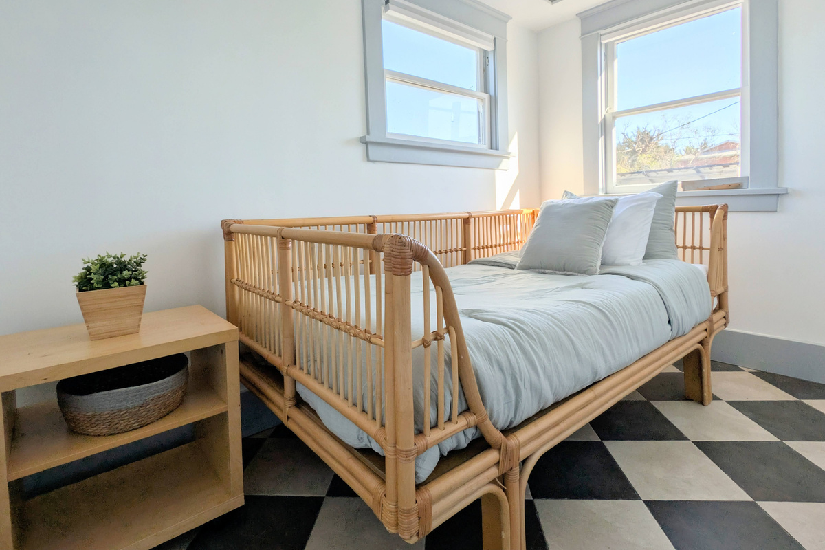 Bright, cozy, and filled with natural light, this charming daybed offers the perfect spot to relax, read, or enjoy a restful night's sleep.