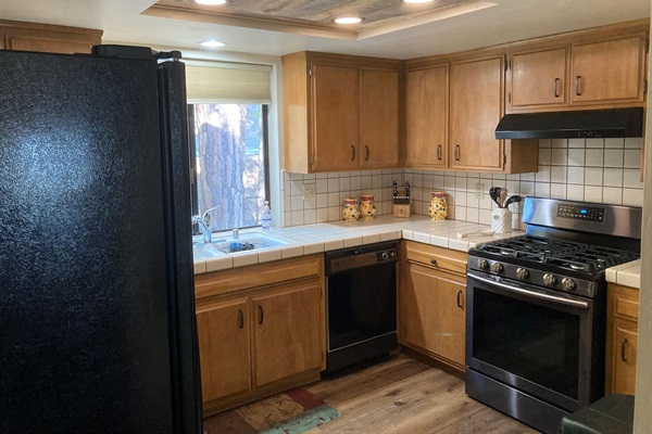 Full kitchen with gas range.