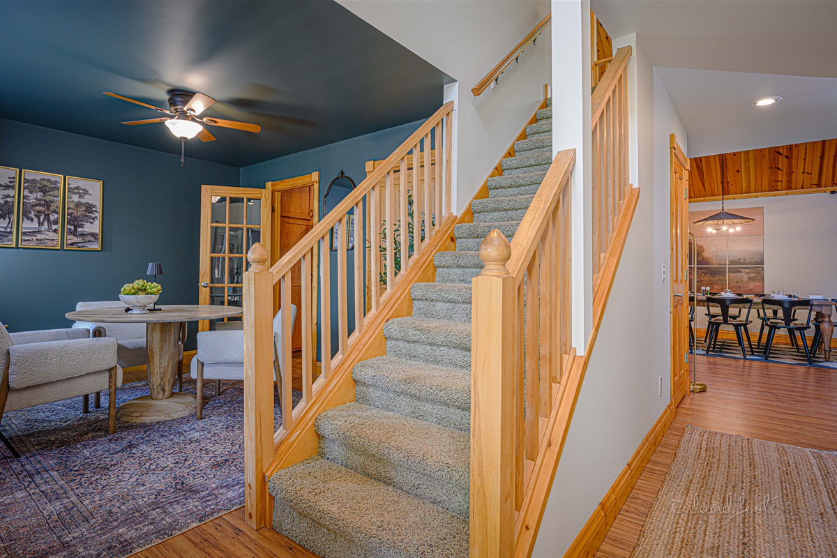 Two bedrooms with a shared full bathroom upstairs