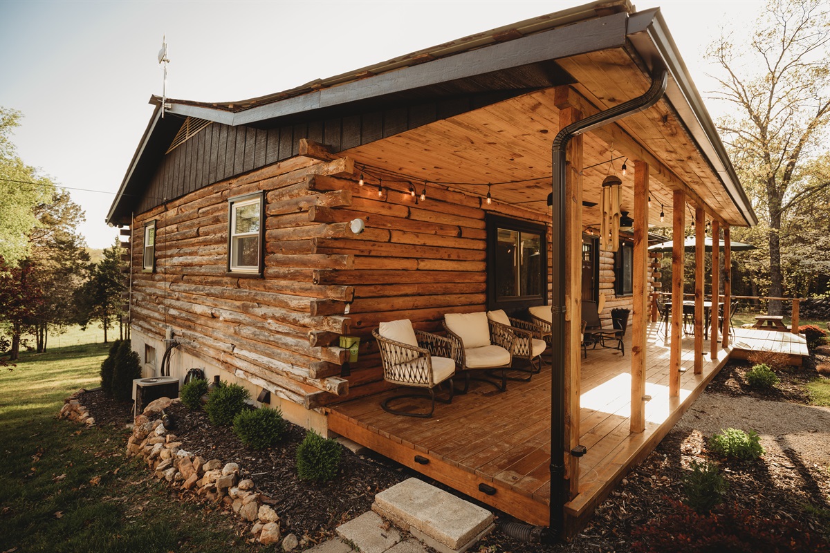 Start your day with a peaceful morning coffee on the covered front porch, surrounded by nature&rsquo;s beauty.