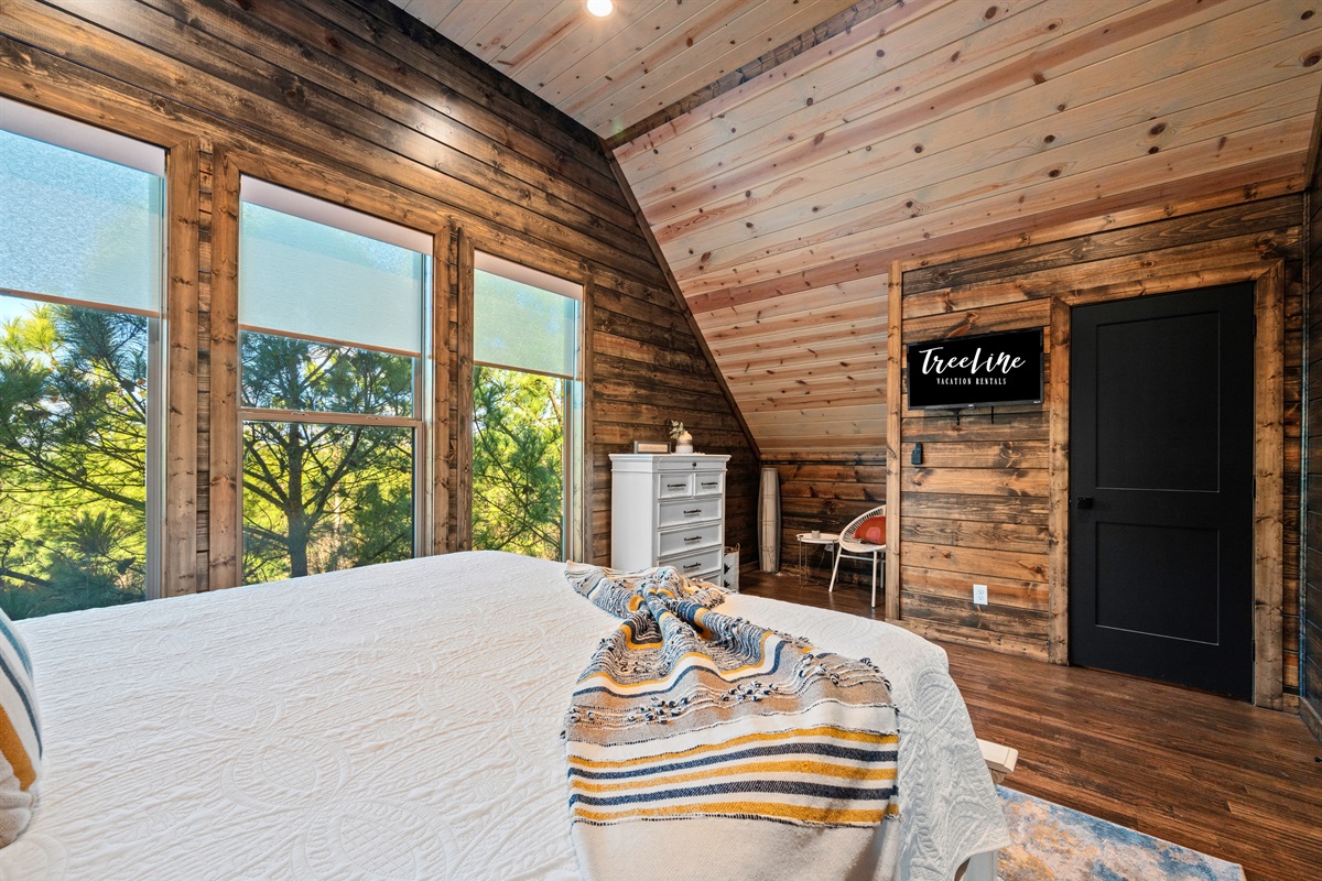 Soft bedding and a cozy layout make this bedroom feel like a restful hideaway where you can truly relax and recharge.