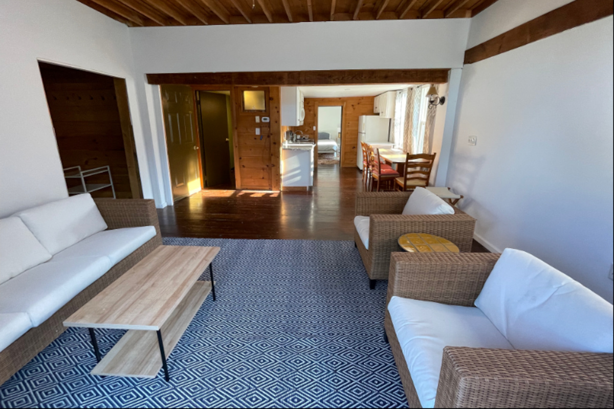 View from the deck's sliding doors into the living room and kitchen
