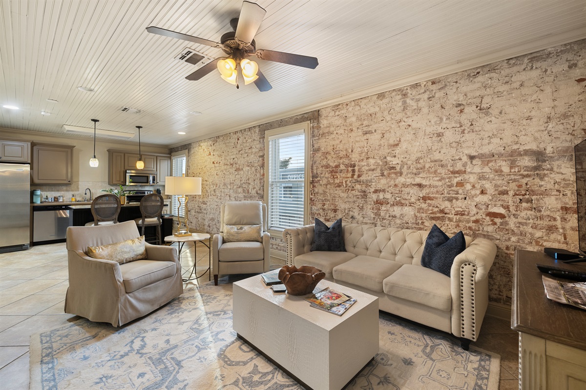 Elegant charm with exposed brick and modern touches. Perfect for relaxing after exploring