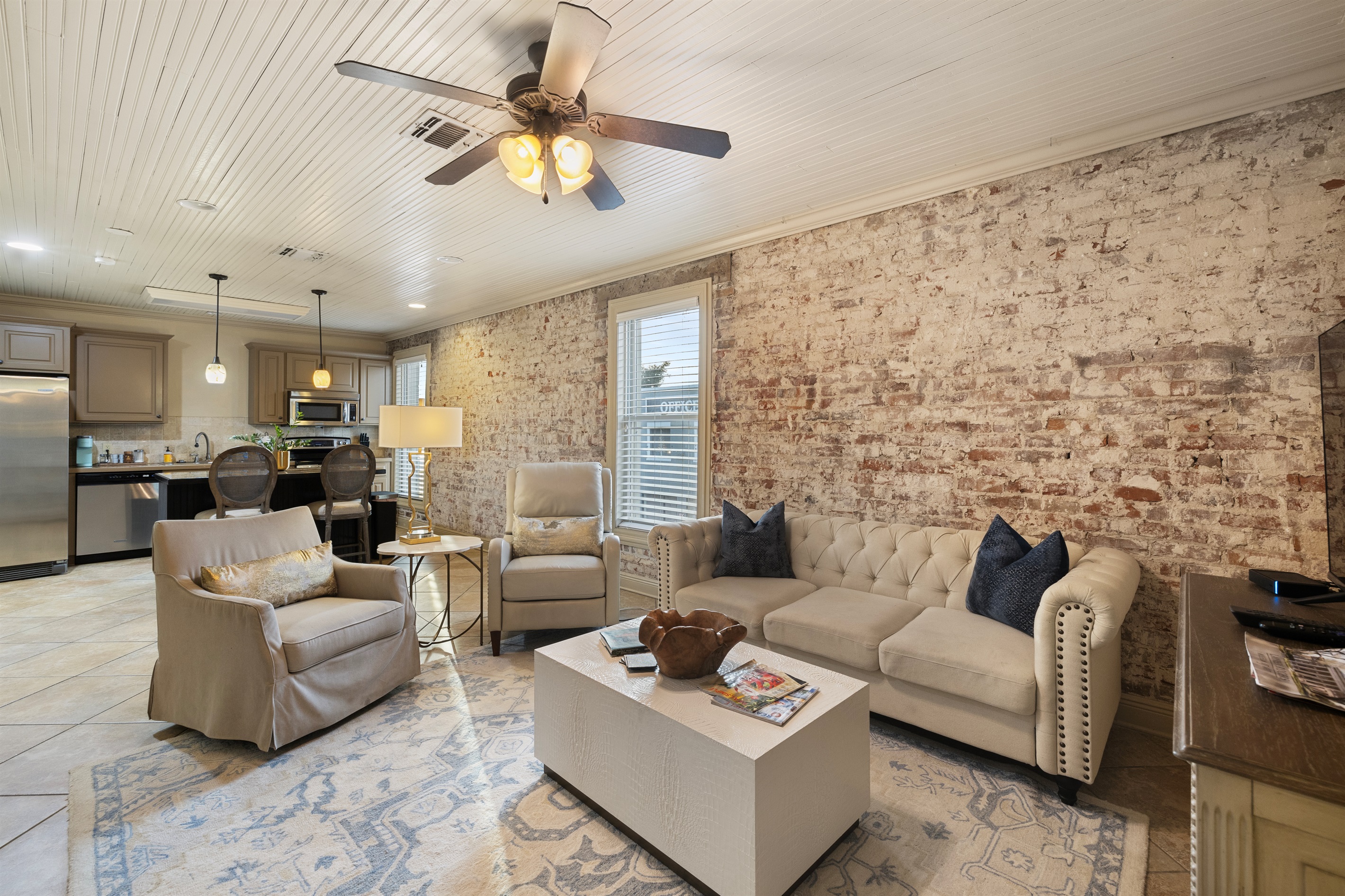 Elegant charm with exposed brick and modern touches. Perfect for relaxing after exploring