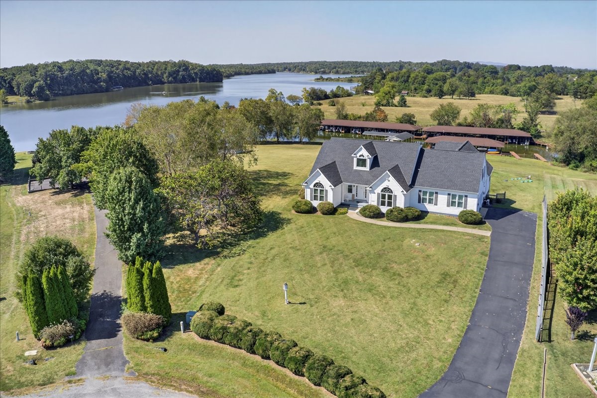 Charming curb appeal with a spacious front lawn.