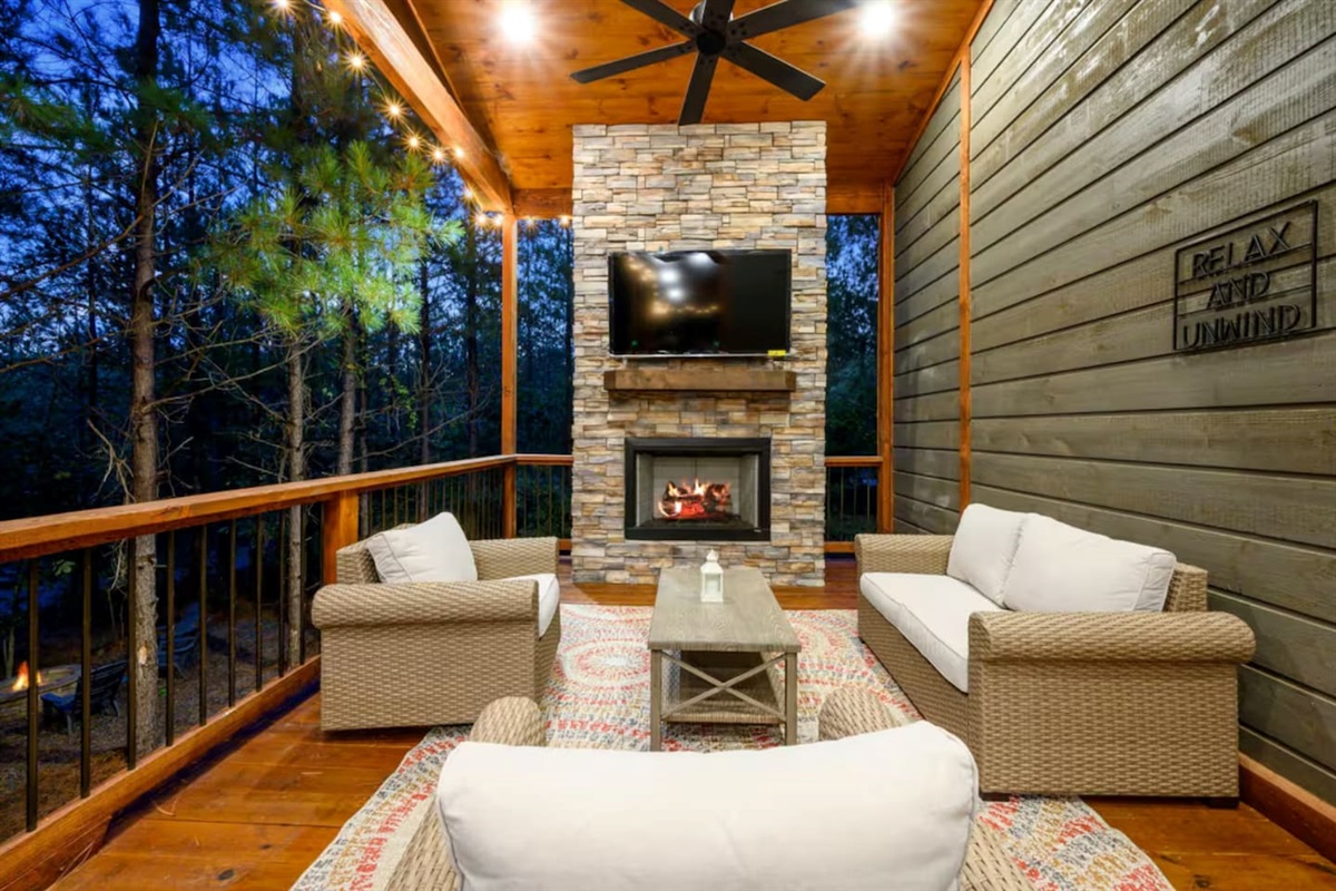 Rustic vibes meet cozy comfort around the perfect outdoor centerpiece.
