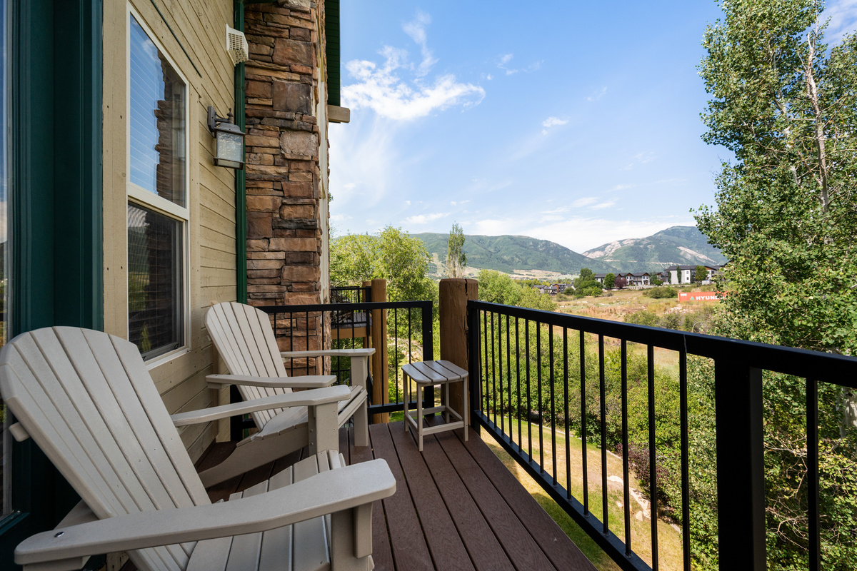 Relax and breathe in the fresh mountain air on the balcony