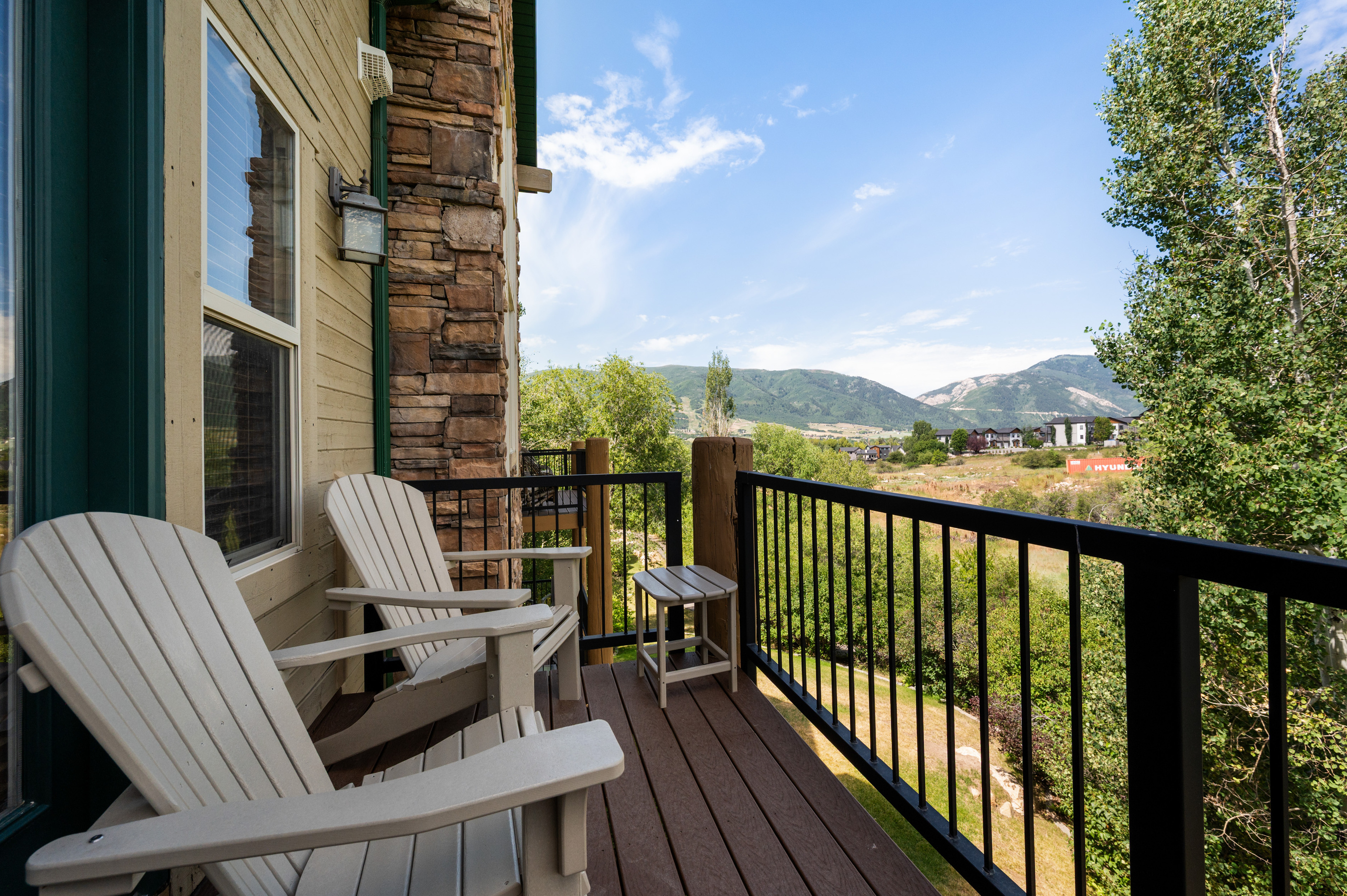 Relax and breathe in the fresh mountain air on the balcony