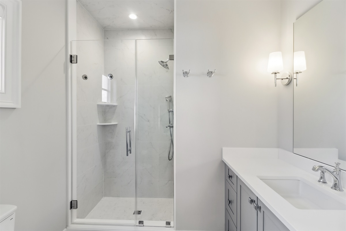 Full bathroom with a shower area